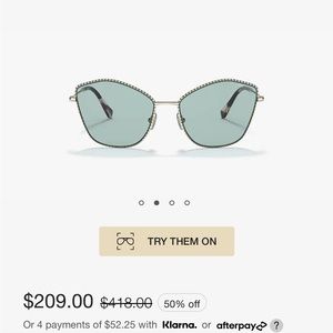 Miu Miu cat eye blue sunglasses